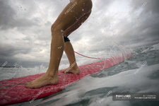 focused_173088834-stock-photo-indonesia-bali-legs-woman-surfboard.jpg